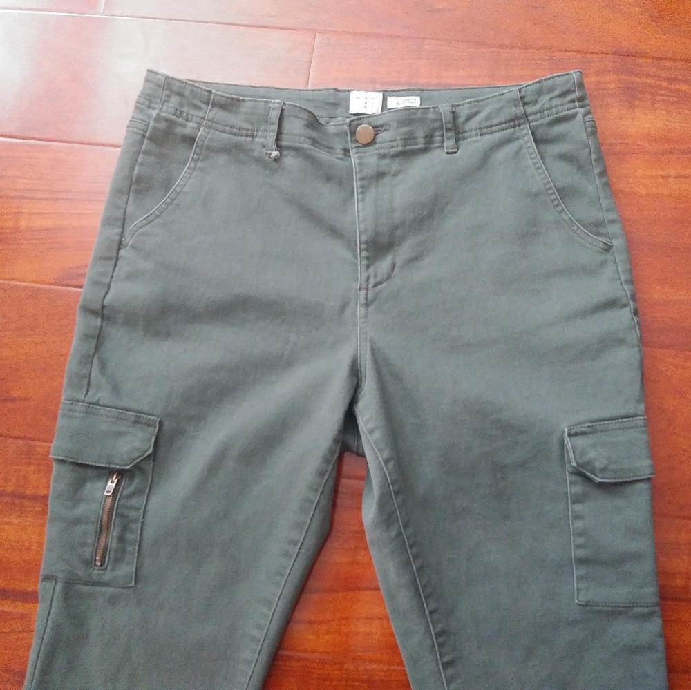 Olive green, cargo styled jeans.